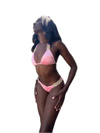 a black woman in a pink bikini posing